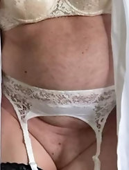 Curious older women, also known as MILFs, are posing completely in the nude.