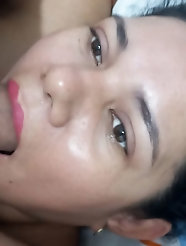 Seductive older woman dressed in revealing attire