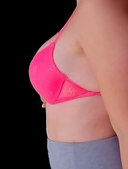 This gallery features a stunning wife in a red lace bra, radiating an angelic beauty